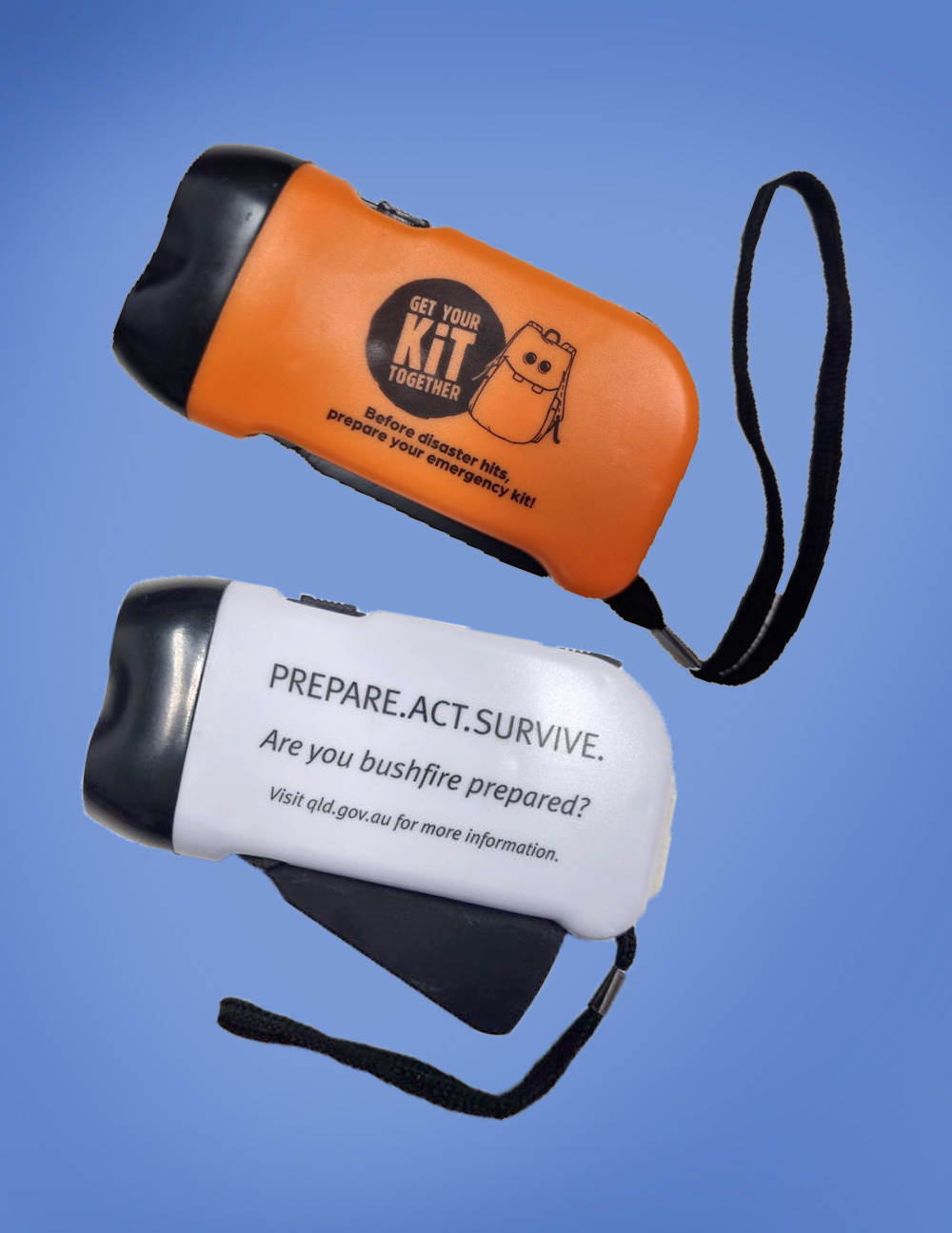 Image shows two portable torches, one white and one orange, both featuring a pump-action recharging lever.  